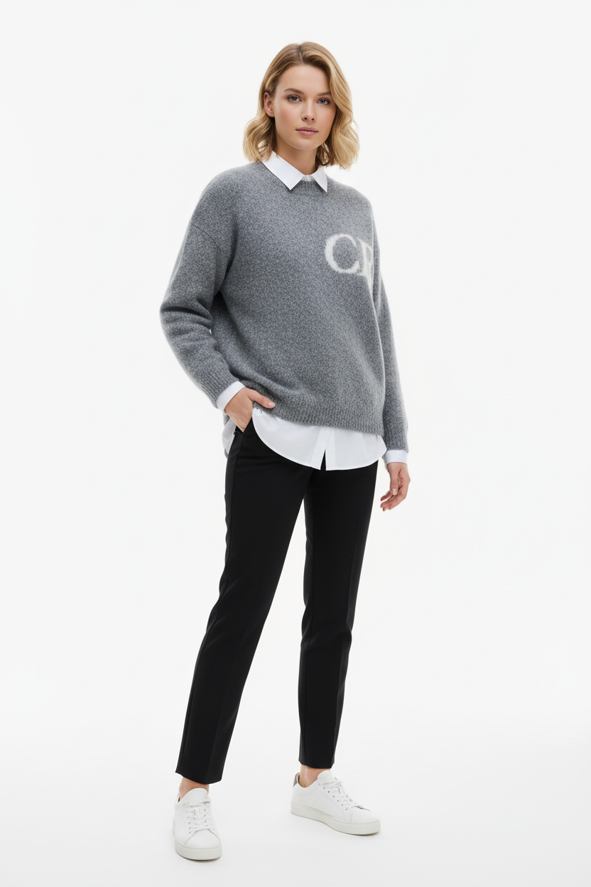 Woman wearing grey CB sweater