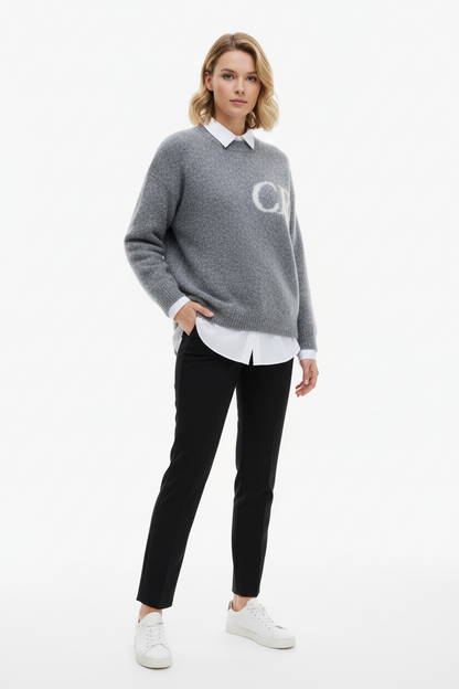 Woman wearing grey CB sweater